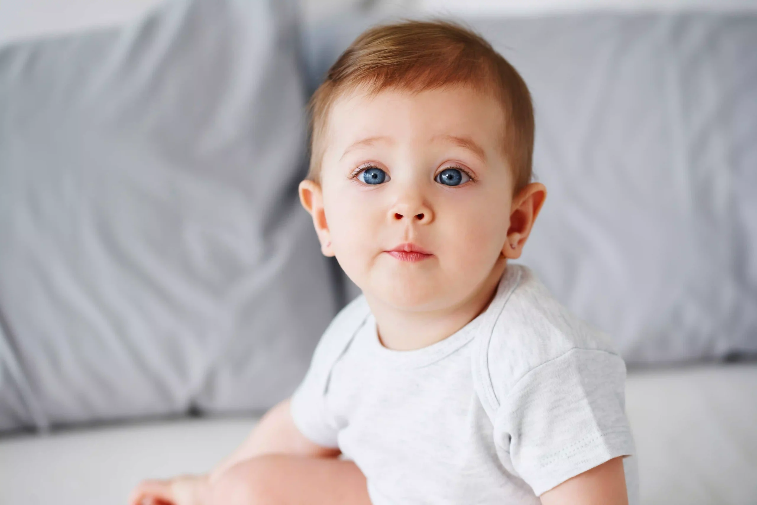 shot-cute-baby-girl-looking-camera